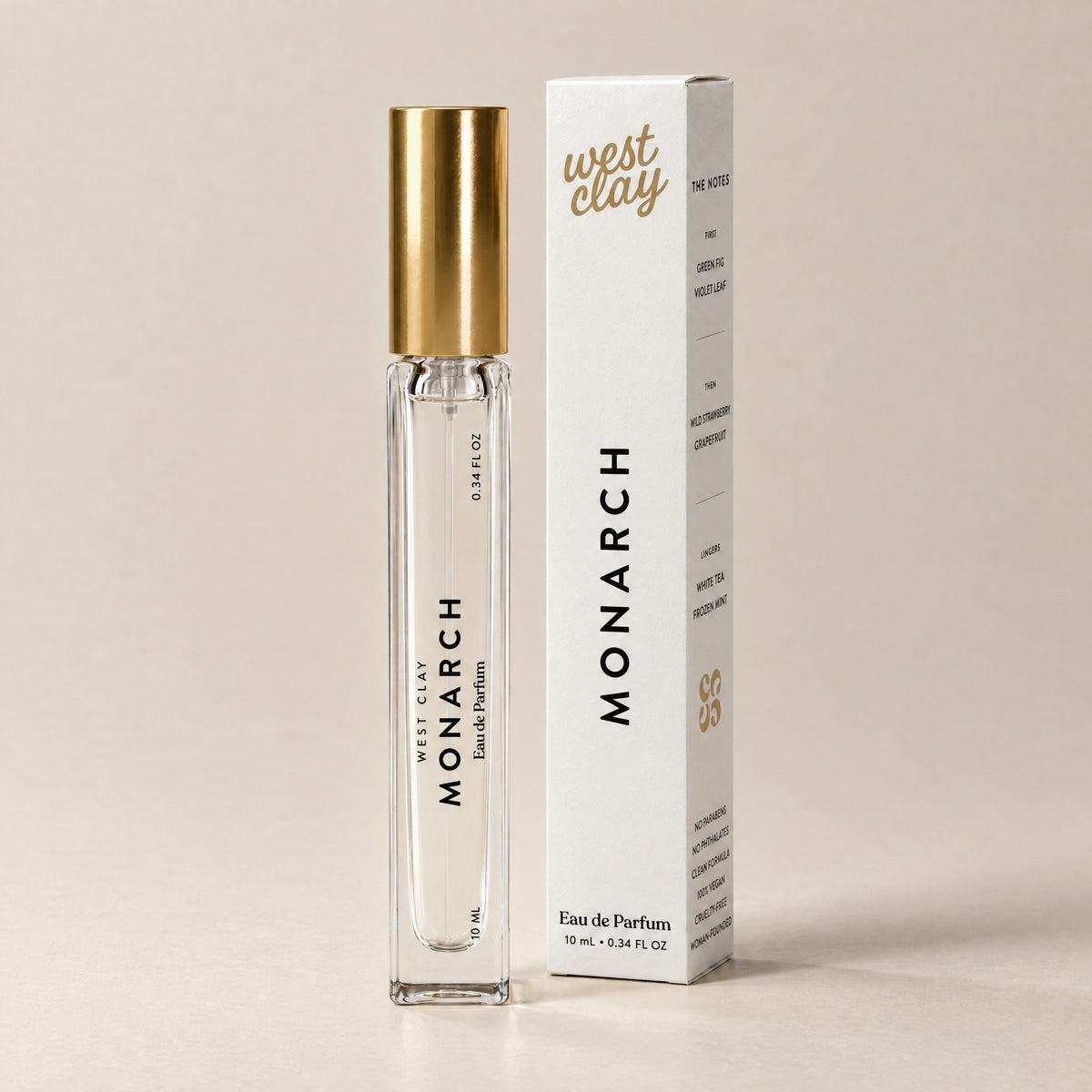 Monarch Eau de Parfum by West Clay, 10 mL travel size vial and box studio photo