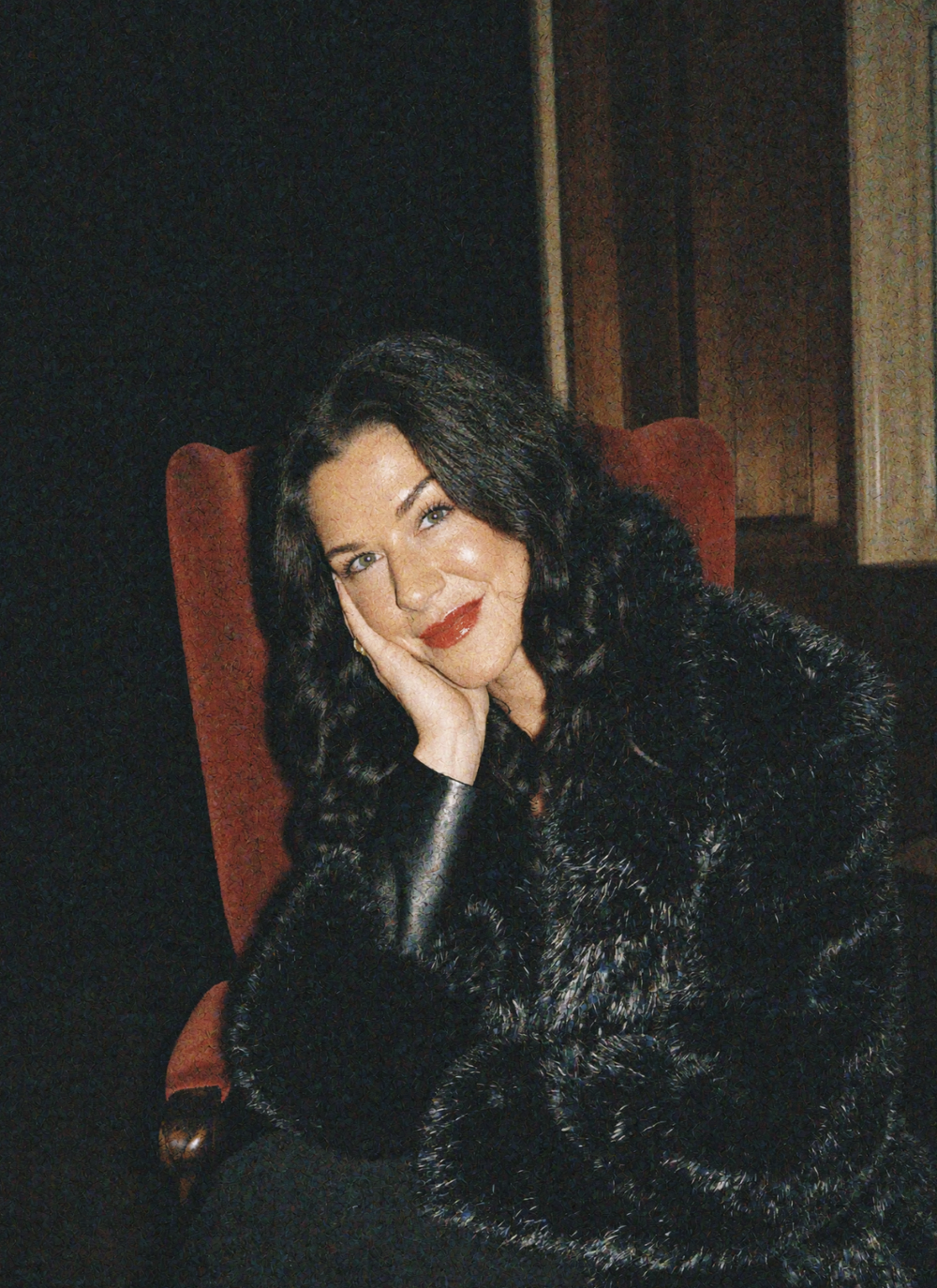 Suzy, founder and perfumer of West Clay, in a black faux-fur coat